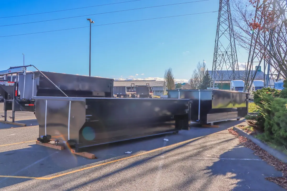 Roll-off dumpster ready for waste disposal at job site for Concrete Dumpster Rental in Metairie